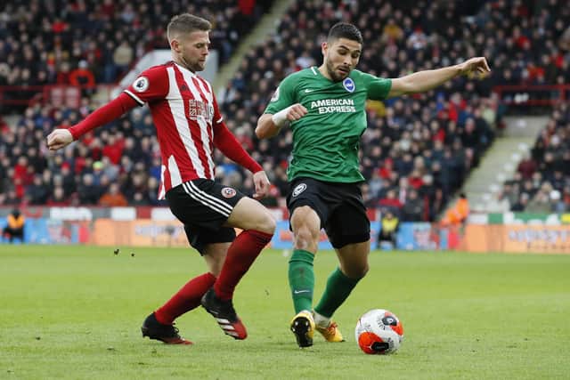 Oliver Norwood of Sheffield Utd tackles Neal Maupay of Brighton during the Premier League match at Bramall Lane, Sheffield. Picture date: 22nd February 2020. Picture credit should read: Simon Bellis/Sportimage
