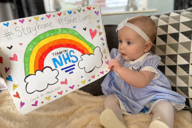 Olivia Rose and her mum Deborah are among many people in Sheffield who have been making rainbow posters to stick in their windows during the coronavirus lockdown