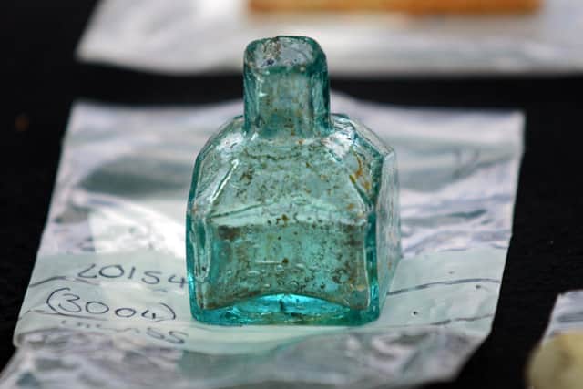 A glass object found during the dig at Sheffield Castle. Picture: Marie Caley.