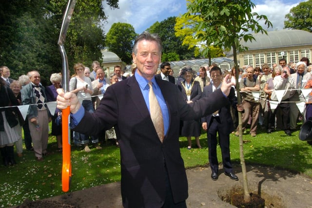 Michael Palin prepares to plant the tree at the opening of the Botanical Gardens on 20 June 2008