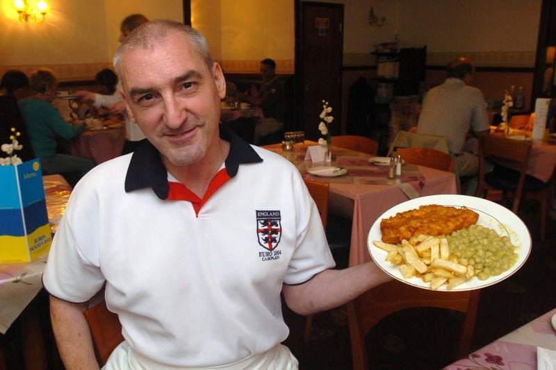 Robert Pearce with his fish and chips at the Robin Hood's Bay Fish and Chip shop, Attercliffe Road, Sheffield