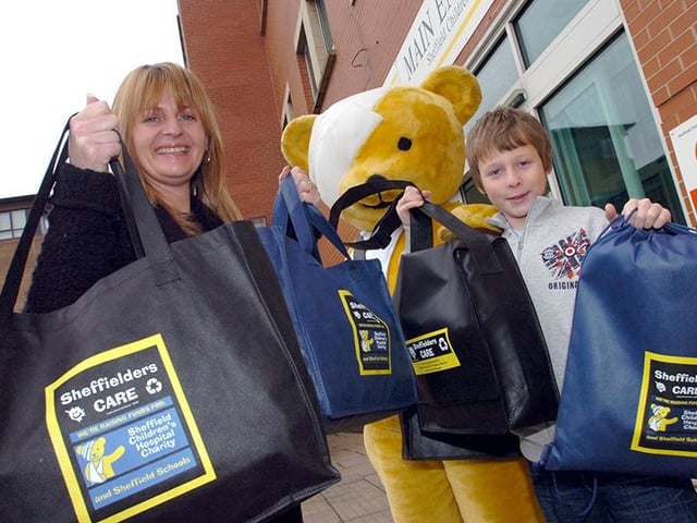 Charibag fundraiser Glenda Kirby and her son, Chester (10) with Theo Bear and some of the Sheffielders care bags at the Sheffield Children's Hospital on February 14, 2007