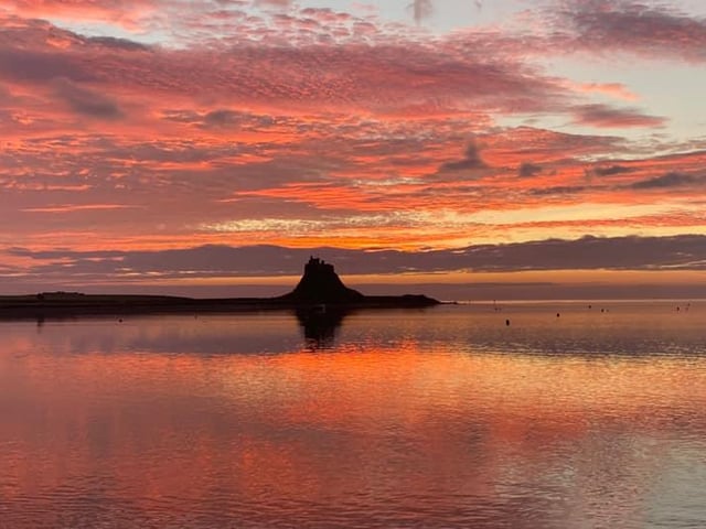 Sunrise on Holy Island, pictured in October 2021.