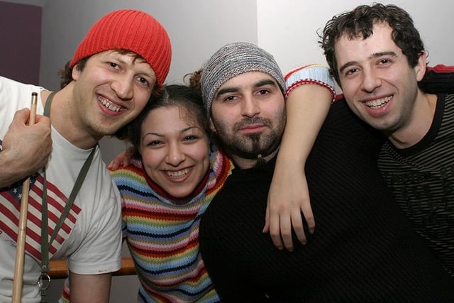 At the R.S.V.P bar, left to right: Kiumars Sadatmandi, Sara Mohadesi, Artin Fardowsi and Reza Samie, March 2004