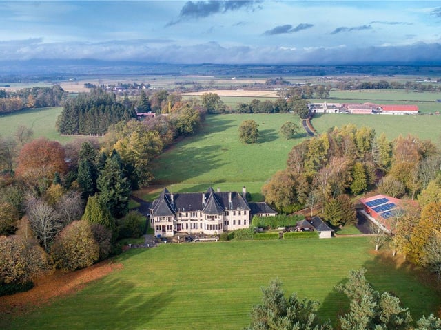 Aerial view of house and grounds.