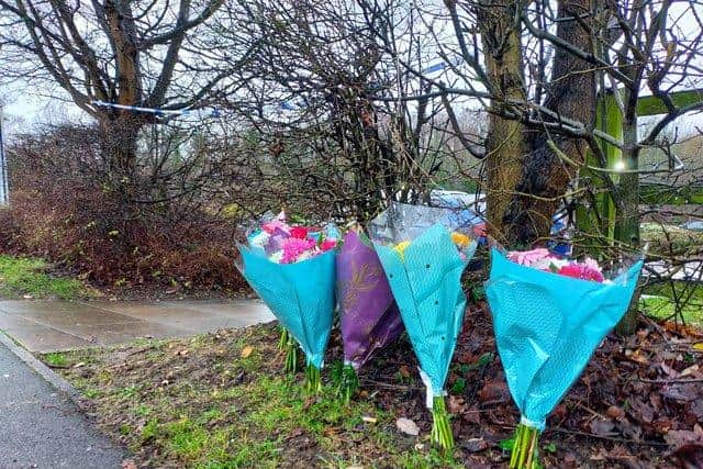 Flowers left outside the Gypsy Queen pub in Beighton following the fatal stabbing of Coley Byrne