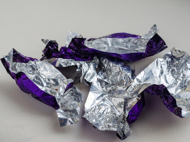 Food wrappers can cause choking or potential obstructions if your dog eats them (Photo: Shutterstock)