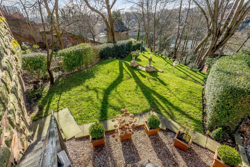 The stunning landscaped garden is arranged over three levels