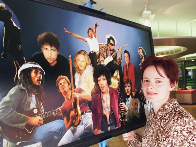 Artist Joanne Shaw with one of her pictures at the centre in March 2000.