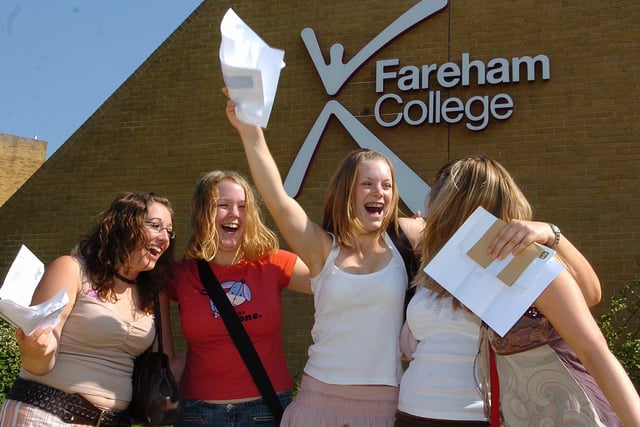 Stephanie Roshier (with form), and her friends celebrate their A level results at Fareham College in 2005. Picture: Ian Hargreaves (053885-6)