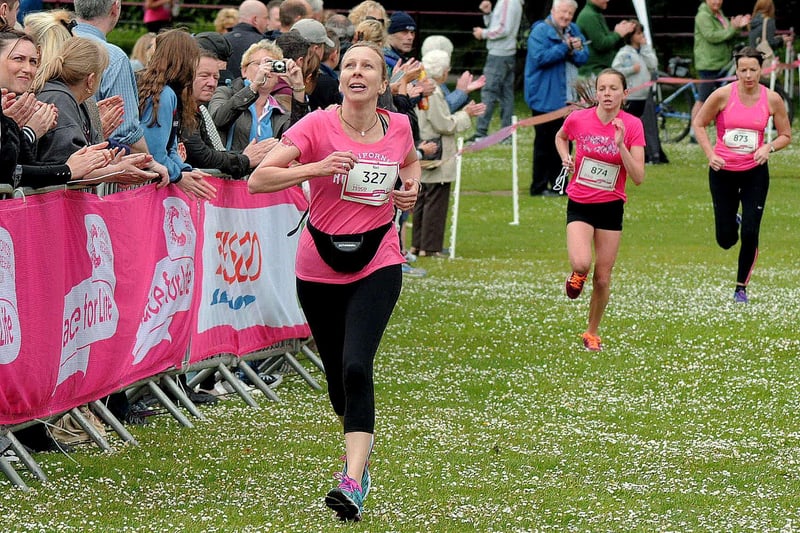 Participants on the last leg of Chesterfield Race for Life in Queen's Park in 2015.