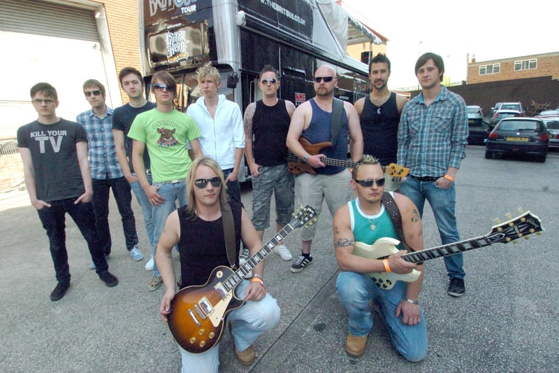 Members of the bands The Find, Aviators, Vida and Darke Horse pictured with the BritBus at Plug, Matilda Street, Sheffield in June 2009
