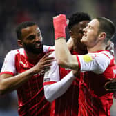 Rotherham United's Ben Wiles (right) celebrates scoring their side's first goal of the game against Lincoln City at AESSEAL New York Stadium. Isaac Parkin/PA Wire.