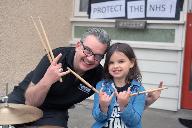David Dowell of dD Drums and his daughter Libbi Dowell 6 playing the drums to spread the joy of noise for the NHS.