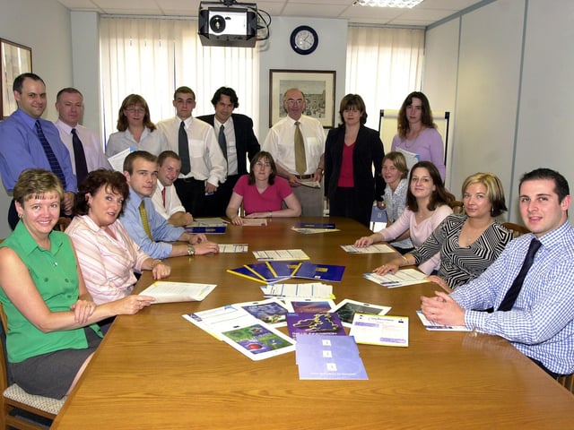 Beta Technology Managing Director Rachel Fletcher (back row, second right) and Chairman Dr Bob Keown OBE (back row, third right) are pictured with staff members at the company's Barclay Court, Doncaster Carr, Doncaster offices in 2002