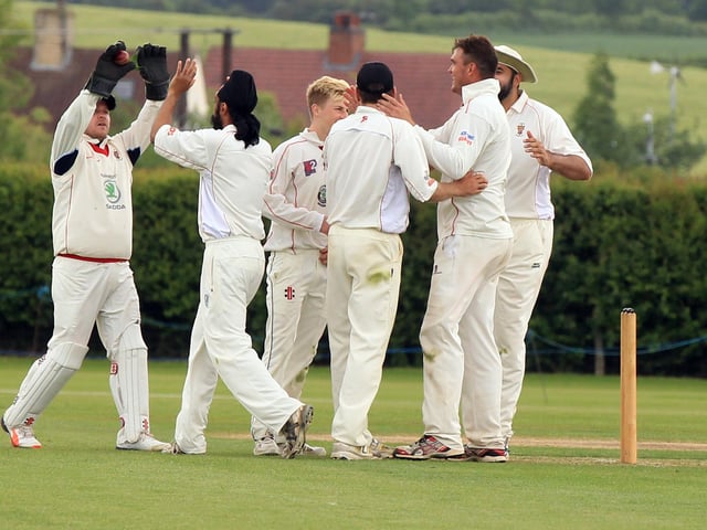 Welbeck bowler Richard Stroh gets a wicket.against Farnsfield CC in May 2013.