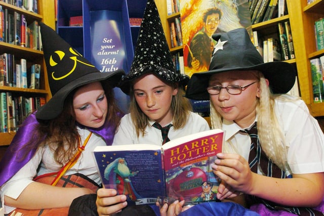 Harry Potter fans Holly White, Harriet McAra and Abigail Ives-Owen get in a little light reading before their sleep over at Woodseats library ready to read The Half-Blood Prince when it released at midnight. Dated July 16, 2005.