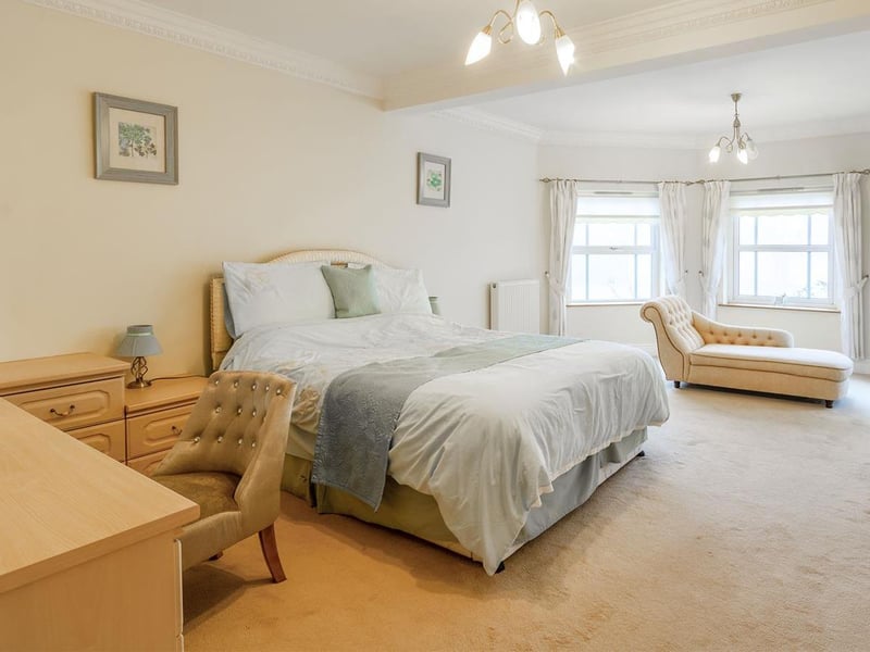 With carpet to flooring, central heating radiator and windows to the rear elevation.