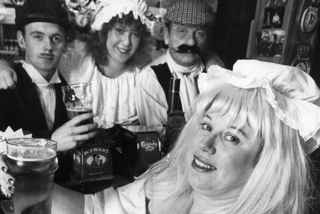 Toasting the 135th anniversary of the Alkali public house in 1992 is landlady Corinne Pinnock and bar staff Joe Abbott, Sue Morris and Hugh Taylor in their Victorian costumes.