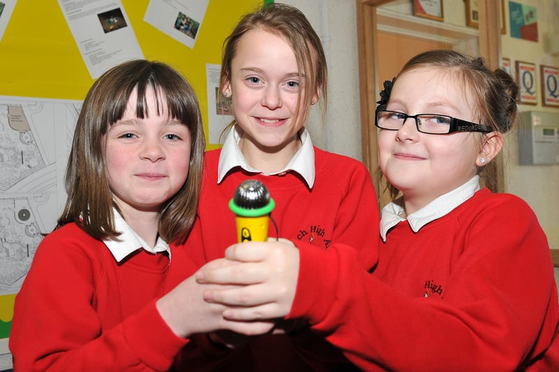 Rossmere Primary School pupils (left to right) Ellie-Jo Dunning, Olivia Hunter and Alex Fletcher were ready to sing in 2013. Does this bring back lovely memories?
