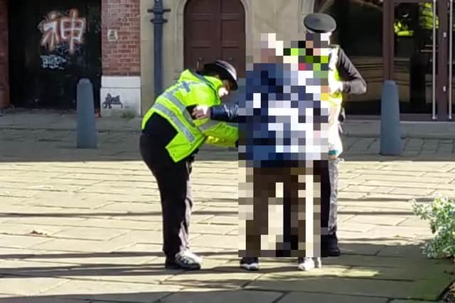 A man is stopped outside the cathedral after Rosco took an interest in him. The man was not carrying any substances, but was offered information material on how to get away from drugs.