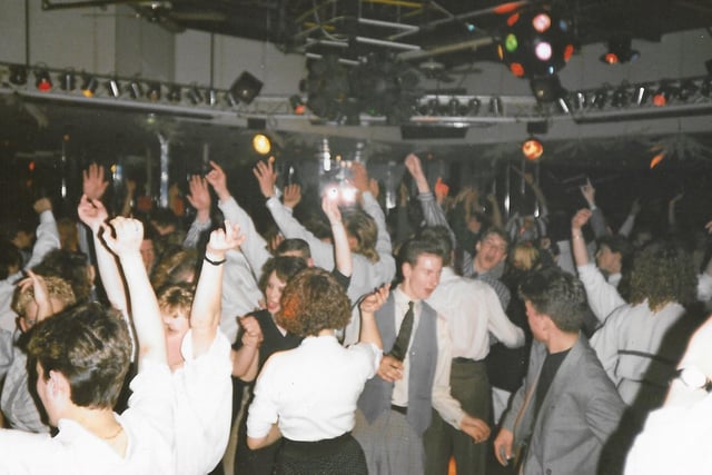 There was a sharp dress sense back in the day - you don't see many guys in suits and ties on the dancefloor these days!