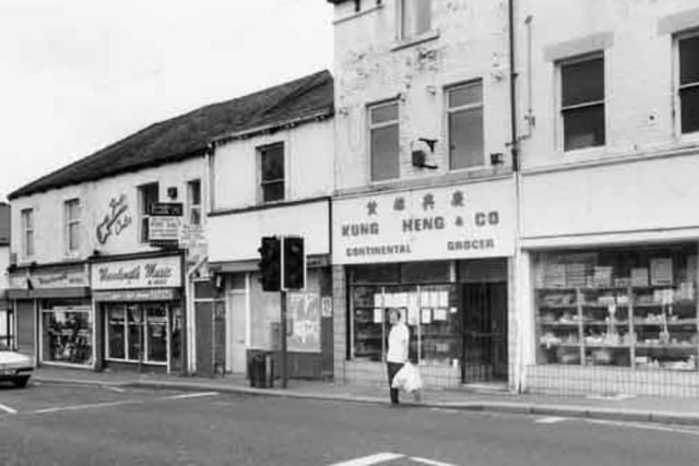 Shops on London Road, Sheffield, in June 1997, showing (right to left) Kung Heng and Co, continental grocer (No.169) and Wavelength Music