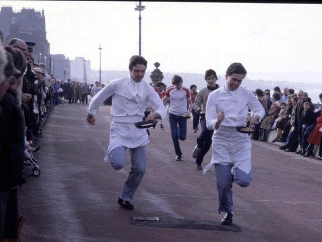Chefs taking part in a pancake race on Portobello promenade in February 1983.