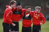 Sander Berge, Oli McBurnie, lliman Ndiaye and Tommy Doyle of Sheffield United are all smiles in training ahead of the weekend Watford clash: Simon Bellis/Sportimage