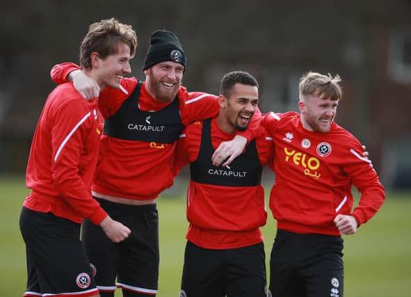 Sander Berge, Oli McBurnie, lliman Ndiaye and Tommy Doyle of Sheffield United are all smiles in training ahead of the weekend Watford clash: Simon Bellis/Sportimage