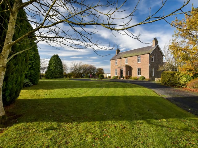 The generously proportioned farmhouse comes with grounds, including a paddock, stretching across more than two acres