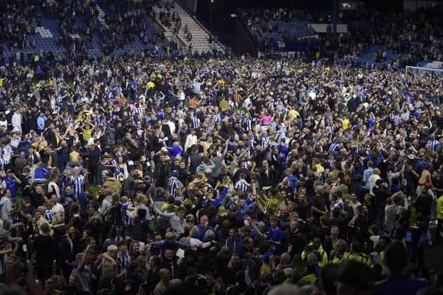Crowds on the pitch at Hillsborough after Sheffield Wednesday beat Peterborough United. (Steve Ellis)