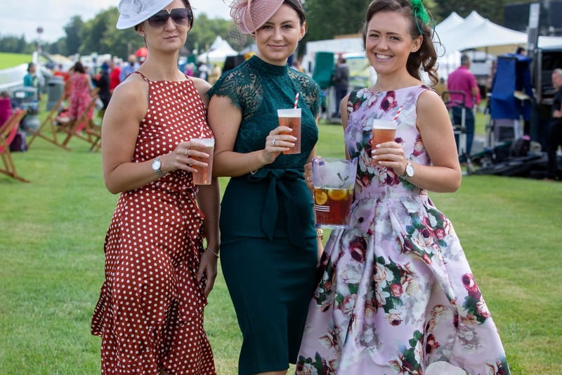 Ladies Day at Qatar Goodwood Festival, Goodwood on 29th July 2021
Pictured:  Kirsty Willis with her sister Amber Willis and 
Emma Cotterill 
Picture: Habibur Rahman