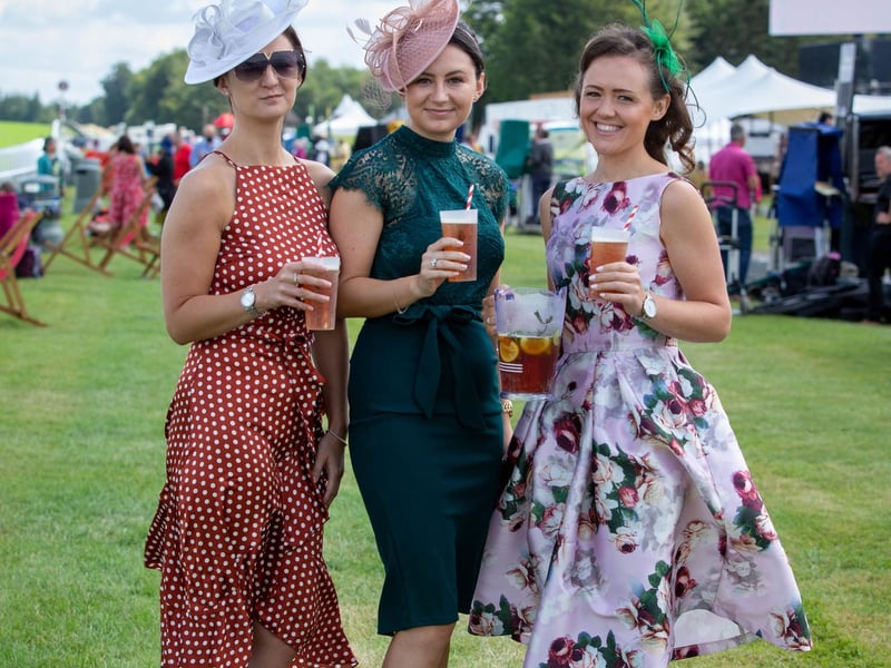 Ladies Day at Qatar Goodwood Festival, Goodwood on 29th July 2021
Pictured:  Kirsty Willis with her sister Amber Willis and 
Emma Cotterill 
Picture: Habibur Rahman