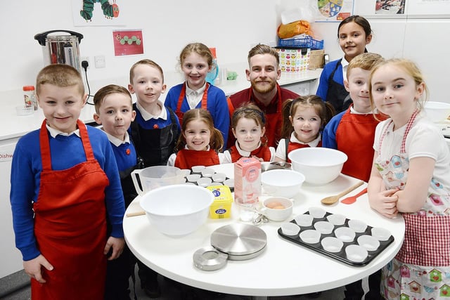 Sunderland AFC goalkeeper Lee Burge poses for a photograph before baking cakes with children during the EFL Day of Action held at the Beacon of Light in 2020.