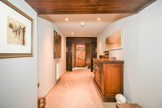 Wooden doors and wood panelled ceilings emphasise the character of the property.