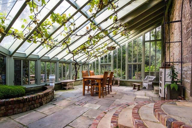 This beautiful orangery is accessed from the lounge and has a stable door leading onto the front garden. The orangery has a stone floor, and decorative pond.