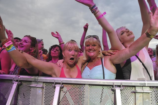 Sister Sledge fans enjoy the party on Devonshire Green in Sheffield, at Tramlines, July 26, 2014