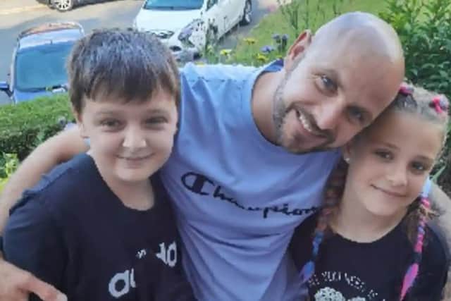 Jason Bennett with his two children - Lacey and John Paul. They were killed in a horror attack in their home in Killamarsh. The children grew up in Sheffield and attended school in the city