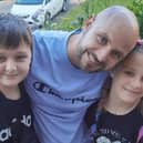 Jason Bennett with his two children - Lacey and John Paul. They were killed in a horror attack in their home in Killamarsh. The children grew up in Sheffield and attended school in the city