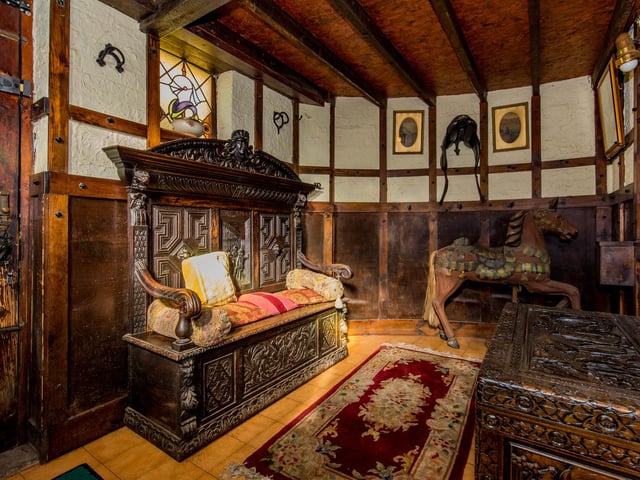 This large entrance has wood panelling.