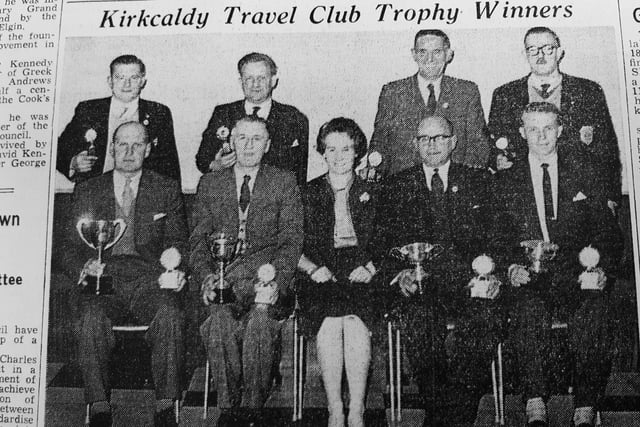 Trophy winning members of Kirkcaldy Travel Club at their annual presentation.
The presentations were made by Mrs Davis, wife of the club president.
Seated: R. Adams, D. Martin, Mrs Davis, W. Nicol, D. Louden.
Standing: J. Freeman, J. McLeod, W. McCulloch, D. Russel..