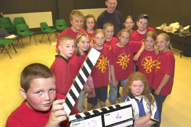 Performing arts summer school was held at Firth Park Community College, in 2001, seen in the  studio making a video are some of the pupils, with Jo Swain, and Full Monty Actor Steve Huison. holding the clapper board is Simon Oxborough.