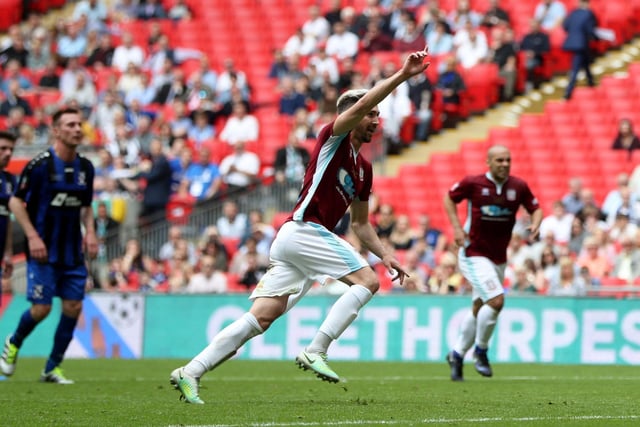 South Shields' Carl Finnigan celebrates scoring his side's first goal of the game during the Buildbase FA Vase Final at Wembley.