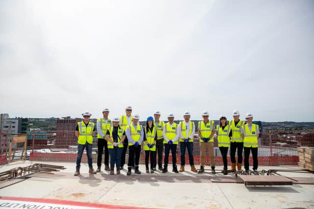 Elshaw House celebrated the construction milestone with a photo opportunity for VIPs from the council and builders, managers and engineers.