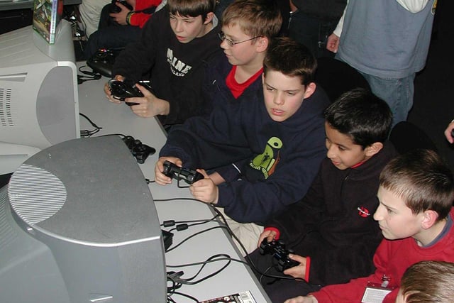 Birkdale pupils try their hands at Electronic Arts' latest  games on  their school trip in 2002