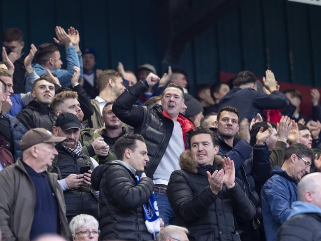 Blues fans celebrate their side's first goal in a 3-0 win at Rochdale.