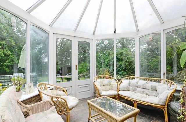 The house has a double glazed conservatory with Cornish slate flooring and double opening French windows leading out onto the garden.