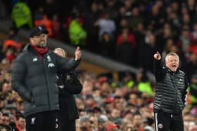 Liverpool's manager Jurgen Klopp (L) and Sheffield United's manager Chris Wilder gesture (Photo by PAUL ELLIS/AFP via Getty Images)