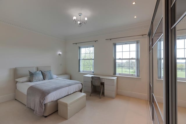 Bedroom three looks out over the rear of the property and has a range of fitted furniture.